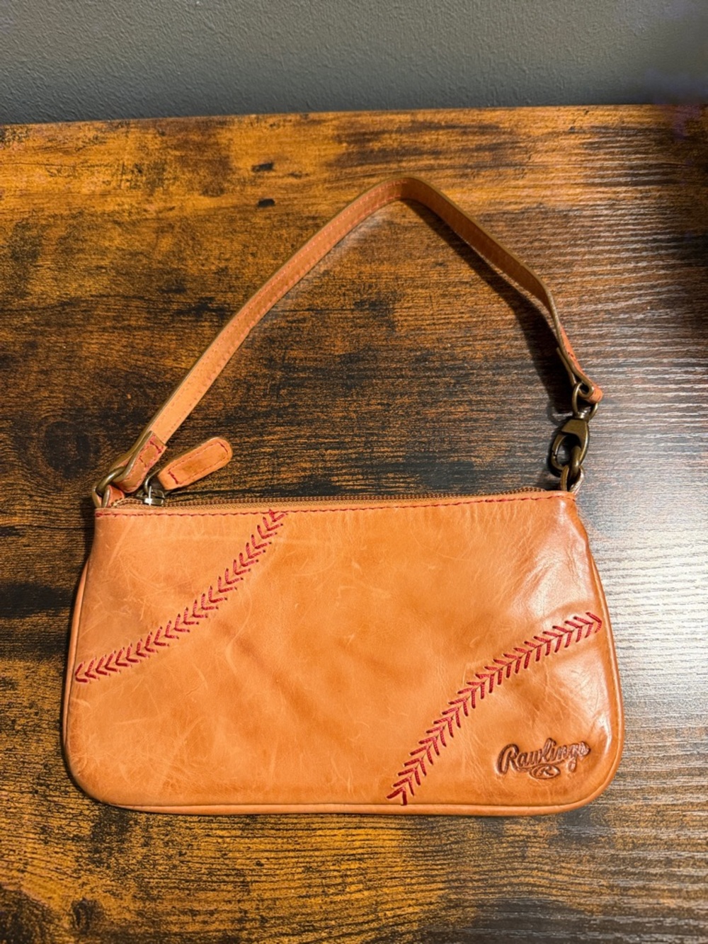 Rawlings Tan Wristlet Clutch with Red Stitching